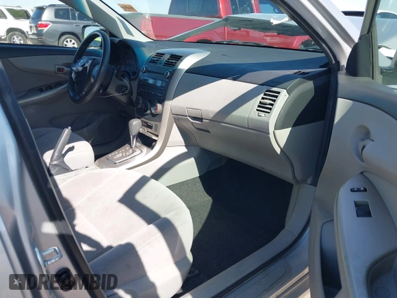 2011 Toyota Corolla L with VIN JTDBU4EE0B9151332, listed as a IAAI auction lot 41970433 with 113,157 mi miles. Bid and sale history available at carsss.com. Image 5.