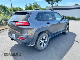2018 Jeep Cherokee Trailhawk z VIN 1C4PJMBX0JD600413, wystawiony jako Copart lot #60336385 z przebiegiem 64 875 mil mil oraz Czysty tytuł • Clean title. Historia ofert i sprzedaży dostępna na DreamBid. Obrazek 4.