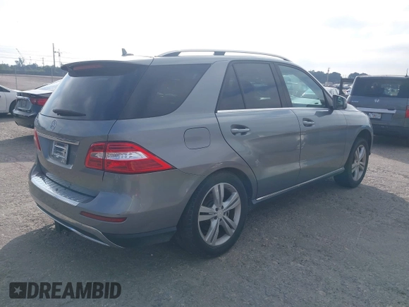 2013 Mercedes-Benz M 350 with VIN 4JGDA5JB1DA166972, listed as a IAAI auction lot 41166335 with 153,059 mi miles and . Bid and sale history available at DreamBid. Image 4.