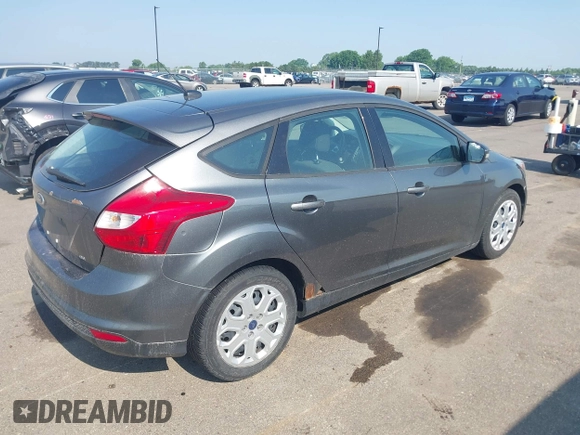 2012 Ford Focus SE z VIN 1FAHP3K21CL347716, wystawiony jako IAAI lot #42415555 z przebiegiem 182 693 mil mil oraz . Historia ofert i sprzedaży dostępna na DreamBid. Obrazek 4.