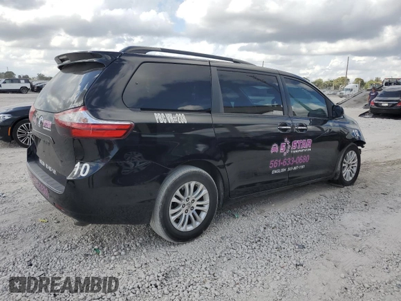 2015 Toyota Sienna XLE with VIN 5TDYK3DC7FS611488, listed as a Copart auction lot 45580075 with 193,344 mi miles and Salvage Title. Bid and sale history available at DreamBid. Image 3.