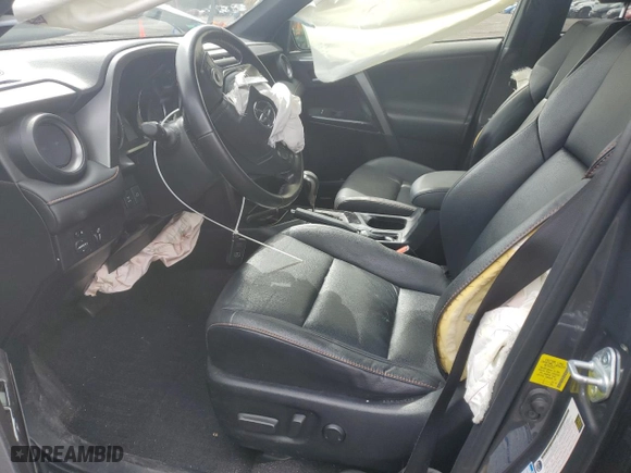 2016 Toyota RAV4 SE with VIN JTMJFREVXGD194048, listed as a Copart auction lot 52296335 with 116,923 mi miles and Salvage Title. Bid and sale history available at carsss.com. Image 7.