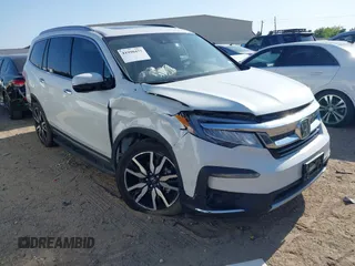 2022 Honda Pilot Touring 7-Passenger с VIN 5FNYF5H64NB027301, выставлен на аукционе IAAI как лот 41990473 с пробегом 21 510 миль миль и . История ставок и продаж доступна на DreamBid. Изображение 1.