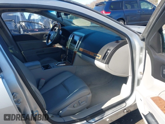 2011 Cadillac STS RWD w/1SB with VIN 1G6DW6ED8B0132119, listed as a IAAI auction lot 42001276 with 148,678 mi miles. Bid and sale history available at carsss.com. Image 5.