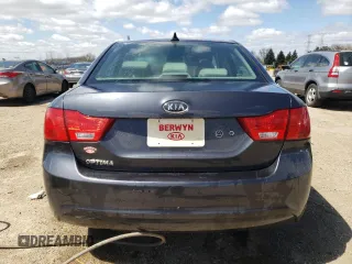 2010 Kia Optima LX z VIN KNAGG4A86A5451165, wystawiony jako Copart lot #52763415 z przebiegiem 213 958 mil mil oraz Szkoda całkowita • Salvage title. Historia ofert i sprzedaży dostępna na DreamBid. Obrazek 6.