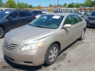 2009 Toyota Camry with VIN 4T1BE46K69U412662, listed as a IAAI auction lot 42072105 with 184,410 mi miles. Bid and sale history available at carsss.com. Image 2.