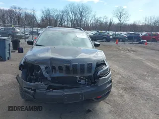 2022 Jeep Cherokee Trailhawk with VIN 1C4PJMBX5ND541929, listed as a IAAI auction lot 41815823 with 68,112 mi miles and . Bid and sale history available at DreamBid. Image 13.