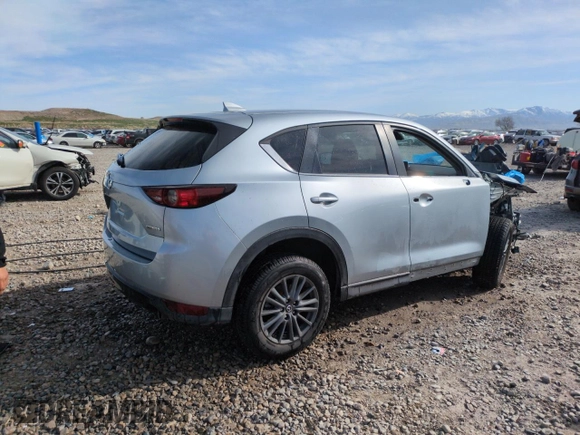 2020 Mazda CX-5 Touring with VIN JM3KFBCMXL0767254, listed as a Copart auction lot 52189335 with 96,922 mi miles and Salvage Title. Bid and sale history available at carsss.com. Image 3.