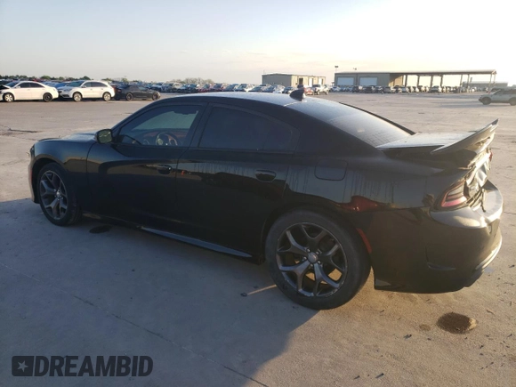 2015 Dodge Charger SXT z VIN 2C3CDXHG0FH866849, wystawiony jako Copart lot #52026055 z przebiegiem 111 043 mil mil oraz Szkoda całkowita • Salvage title. Historia ofert i sprzedaży dostępna na DreamBid. Obrazek 2.