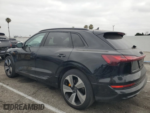 2022 Audi e-tron Premium Plus with VIN WA1LAAGE4NB014605, listed as a Copart auction lot 61127385 with 26,355 mi miles and Salvage title. Bid and sale history available at DreamBid. Image 2.