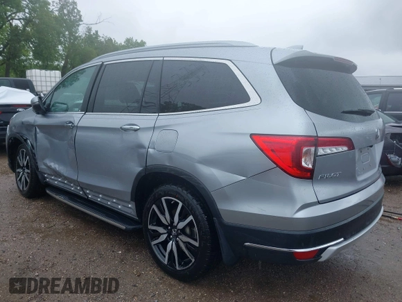 2019 Honda Pilot Touring 8-Passenger with VIN 5FNYF6H98KB097105, listed as a IAAI auction lot 42353009 with 133,212 mi miles and . Bid and sale history available at DreamBid. Image 3.