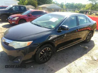 2012 Toyota Camry L with VIN 4T1BF1FK4CU002252, listed as a IAAI auction lot 42201973 with 261,460 mi miles. Bid and sale history available at carsss.com. Image 2.