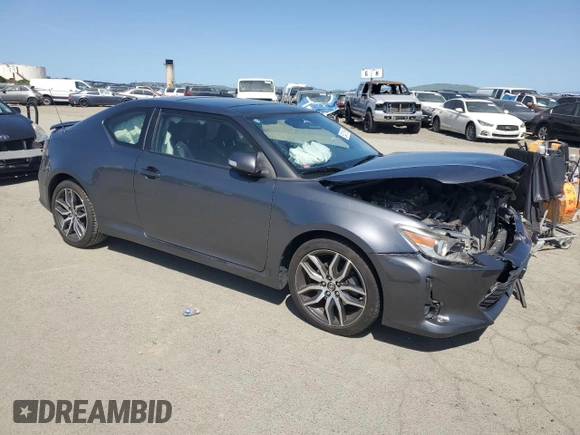 2014 Scion tC with VIN JTKJF5C7XE3085579, listed as a Copart auction lot 52431165 with 44,421 mi miles and Salvage Title. Bid and sale history available at carsss.com. Image 4.
