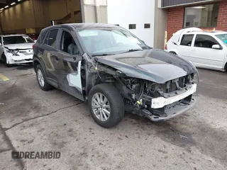 2016 Mazda CX-5 Touring z VIN JM3KE2CY2G0616310, wystawiony jako IAAI lot #41462586 z przebiegiem 145 721 mil mil oraz . Historia ofert i sprzedaży dostępna na DreamBid. Obrazek 1.
