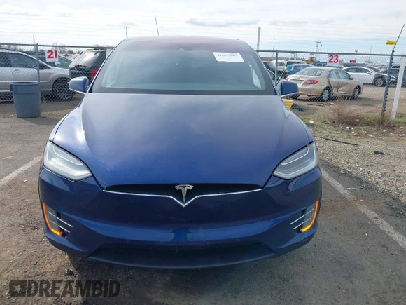 2016 Tesla Model X 70D z VIN 5YJXCAE29GF015890, wystawiony jako IAAI lot #41637564 z przebiegiem 145 848 mil mil oraz . Historia ofert i sprzedaży dostępna na DreamBid. Obrazek 12.