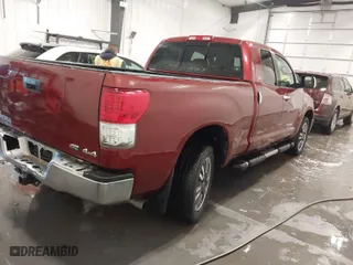 2010 Toyota Tundra 4WD Truck with VIN 5TFUW5F16AX113067, listed as a IAAI auction lot 41826361 with 128,279 mi miles. Bid and sale history available at carsss.com. Image 4.
