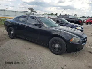 2012 Dodge Charger Police with VIN 2C3CDXAT7CH288137, listed as a Copart auction lot 63271415 with 272,393 mi miles and Clean title. Bid and sale history available at DreamBid. Image 4.