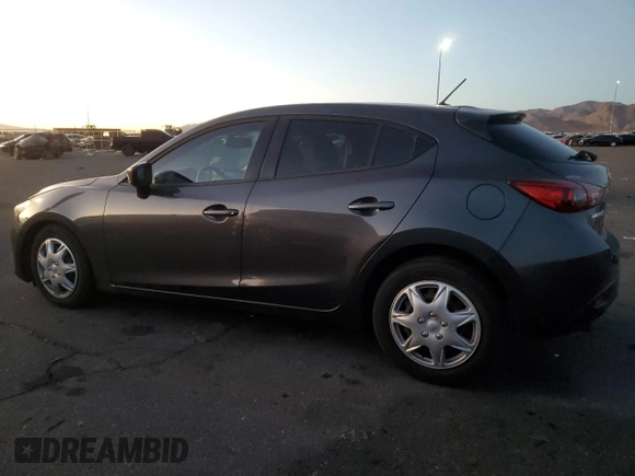 2016 Mazda 3 i Sport with VIN JM1BM1J71G1310869, listed as a Copart auction lot 86384774 with 98,893 mi miles and Salvage Title. Bid and sale history available at DreamBid. Image 2.