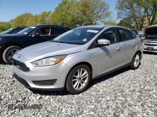 2016 Ford Focus SE with VIN 1FADP3F2XGL375416, listed as a Copart auction lot 56629555 with 52,006 mi miles and Salvage title. Bid and sale history available at DreamBid. Image 1.