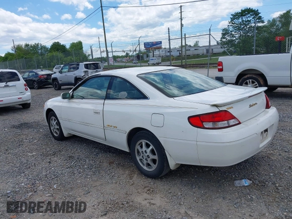 1999 Toyota Solara SE with VIN 2T1CF22PXXC233661, listed as a IAAI auction lot 42196878 with 157,682 mi miles. Bid and sale history available at carsss.com. Image 3.