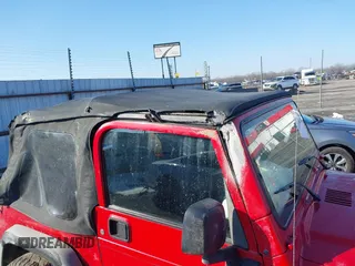 2005 Jeep Wrangler X with VIN 1J4FA39S95P385581, listed as a IAAI auction lot 41333338 with 150,010 mi miles and . Bid and sale history available at DreamBid. Image 12.