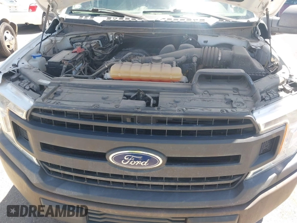 2018 Ford F-150 XL with VIN 1FTMF1CB1JKC58164, listed as a IAAI auction lot 42289514 with 57,075 mi miles and . Bid and sale history available at DreamBid. Image 10.