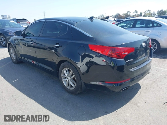 2013 Kia Optima LX z VIN 5XXGM4A75DG239179, wystawiony jako IAAI lot #41831088 z przebiegiem 128 411 mil mil oraz . Historia ofert i sprzedaży dostępna na DreamBid. Obrazek 3.