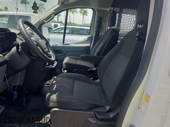 2018 Ford Transit with VIN 1FTYR1ZMXJKB47999, listed as a IAAI auction lot 42787302 with 140,957 mi miles and . Bid and sale history available at DreamBid. Image 18.