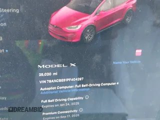 2023 Tesla Model X with VIN 7SAXCBE51PF404297, listed as a IAAI auction lot 41314595 with 25,020 mi miles and . Bid and sale history available at DreamBid. Image 7.