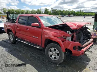 2017 Toyota Tacoma SR5 z VIN 5TFAZ5CN2HX025077, wystawiony jako Copart lot #57131105 z przebiegiem 153 705 mil mil oraz Szkoda całkowita • Salvage title. Historia ofert i sprzedaży dostępna na DreamBid. Obrazek 4.