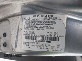 2008 Ford Focus SE with VIN 1FAHP33NX8W135881, listed as a IAAI auction lot 41668949 with 160,261 mi miles. Bid and sale history available at carsss.com. Image 9.