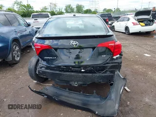 2017 Toyota Corolla L z VIN 2T1BURHE7HC772787, wystawiony jako IAAI lot #42189922 z przebiegiem 100 865 mil mil oraz . Historia ofert i sprzedaży dostępna na DreamBid. Obrazek 17.