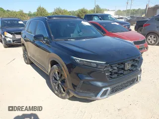 2023 Honda CR-V Sport Touring with VIN 2HKRS6H97PH804042, listed as a IAAI auction lot 42041207 with 19,152 mi miles and . Bid and sale history available at DreamBid. Image 1.