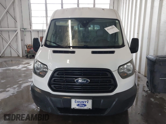 2017 Ford Transit Cargo with VIN 1FTYE1CM1HKA22579, listed as a IAAI auction lot 42342002 with 91,864 mi miles and . Bid and sale history available at DreamBid. Image 12.