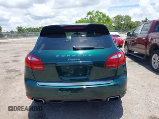2014 Porsche Cayenne with VIN WP1AA2A21ELA06570, listed as a IAAI auction lot 42473298 with 61,421 mi miles and . Bid and sale history available at DreamBid. Image 17.