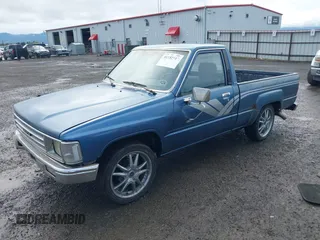 1988 Toyota Pickup with VIN JT4RN50R5J5169942, listed as a IAAI auction lot 42152517 with 218,579 mi miles and . Bid and sale history available at DreamBid. Image 18.