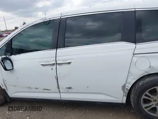 2012 Honda Odyssey EX-L with VIN 5FNRL5H67CB082903, listed as a IAAI auction lot 42015904 with 208,300 mi miles and . Bid and sale history available at carsss.com. Image 14.