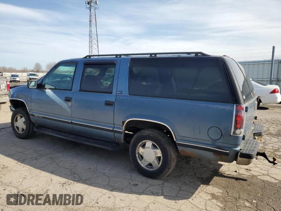 1997 GMC Suburban with VIN 1GKFK16R7VJ707618, listed as a Copart auction lot 49882035 with 317,771 mi miles and Salvage Title. Bid and sale history available at carsss.com. Image 2.