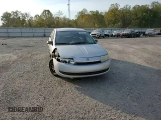2004 Saturn ION ION 1 z VIN 1G8AG52F44Z127750, wystawiony jako Copart lot #75961964 z przebiegiem 104 567 mil mil oraz Szkoda całkowita • Salvage title. Historia ofert i sprzedaży dostępna na DreamBid. Obrazek 11.