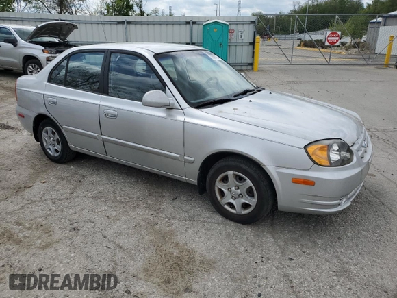 2004 Hyundai Accent GL with VIN KMHCG45C94U515186, listed as a Copart auction lot 52697284 with 49,236 mi miles and Salvage Title. Bid and sale history available at carsss.com. Image 4.