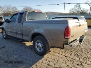 2001 Ford F-150 XL with VIN 1FTRX17L41NA96180, listed as a Copart auction lot 87309224 with 95,505 mi miles and Salvage title. Bid and sale history available at DreamBid. Image 2.