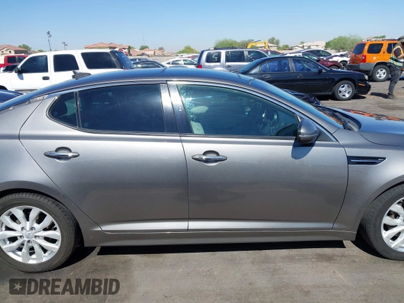 2014 Kia Optima EX z VIN 5XXGN4A72EG339786, wystawiony jako IAAI lot #42328516 z przebiegiem 103 035 mil mil oraz . Historia ofert i sprzedaży dostępna na DreamBid. Obrazek 14.