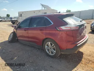 2019 Ford Edge SEL with VIN 2FMPK3J9XKBB38715, listed as a Copart auction lot 62156395 with 125,758 mi miles and Salvage title. Bid and sale history available at DreamBid. Image 2.