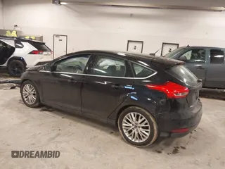 2017 Ford Focus Titanium with VIN 1FADP3N25HL222297, listed as a IAAI auction lot 41698707 with 121,756 mi miles and . Bid and sale history available at carsss.com. Image 3.