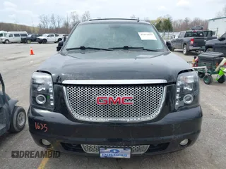 2011 GMC Yukon SLT with VIN 1GKS2CE01BR347675, listed as a IAAI auction lot 41931635 with 247,817 mi miles. Bid and sale history available at carsss.com. Image 6.