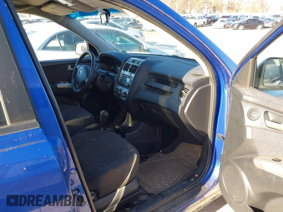 2005 Kia Sportage LX with VIN KNDJF723157097517, listed as a IAAI auction lot 41485759 with 207,294 mi miles and . Bid and sale history available at carsss.com. Image 5.