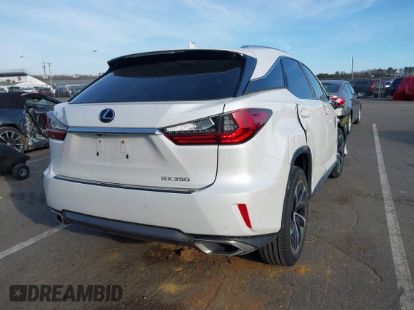2018 Lexus RX 350 with VIN 2T2BZMCA7JC143069, listed as a IAAI auction lot 41654380 with 80,045 mi miles and . Bid and sale history available at DreamBid. Image 4.