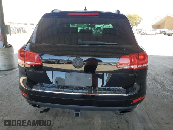 2013 Volkswagen Touareg Lux with VIN WVGEF9BPXDD001489, listed as a Copart auction lot 55898945 with 96,477 mi miles and Clean Title. Bid and sale history available at DreamBid. Image 6.