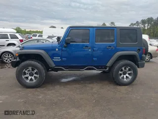 2010 Jeep Wrangler Unlimited Sport with VIN 1J4BA3H11AL144560, listed as a IAAI auction lot 42013032 with 226,233 mi miles. Bid and sale history available at carsss.com. Image 14.