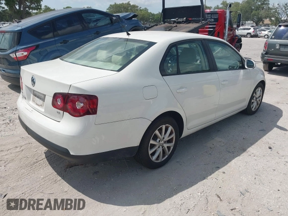 2010 Volkswagen Jetta Sedan Limited with VIN 3VWAZ7AJ7AM148894, listed as a IAAI auction lot 42173838 with 113,415 mi miles. Bid and sale history available at carsss.com. Image 4.